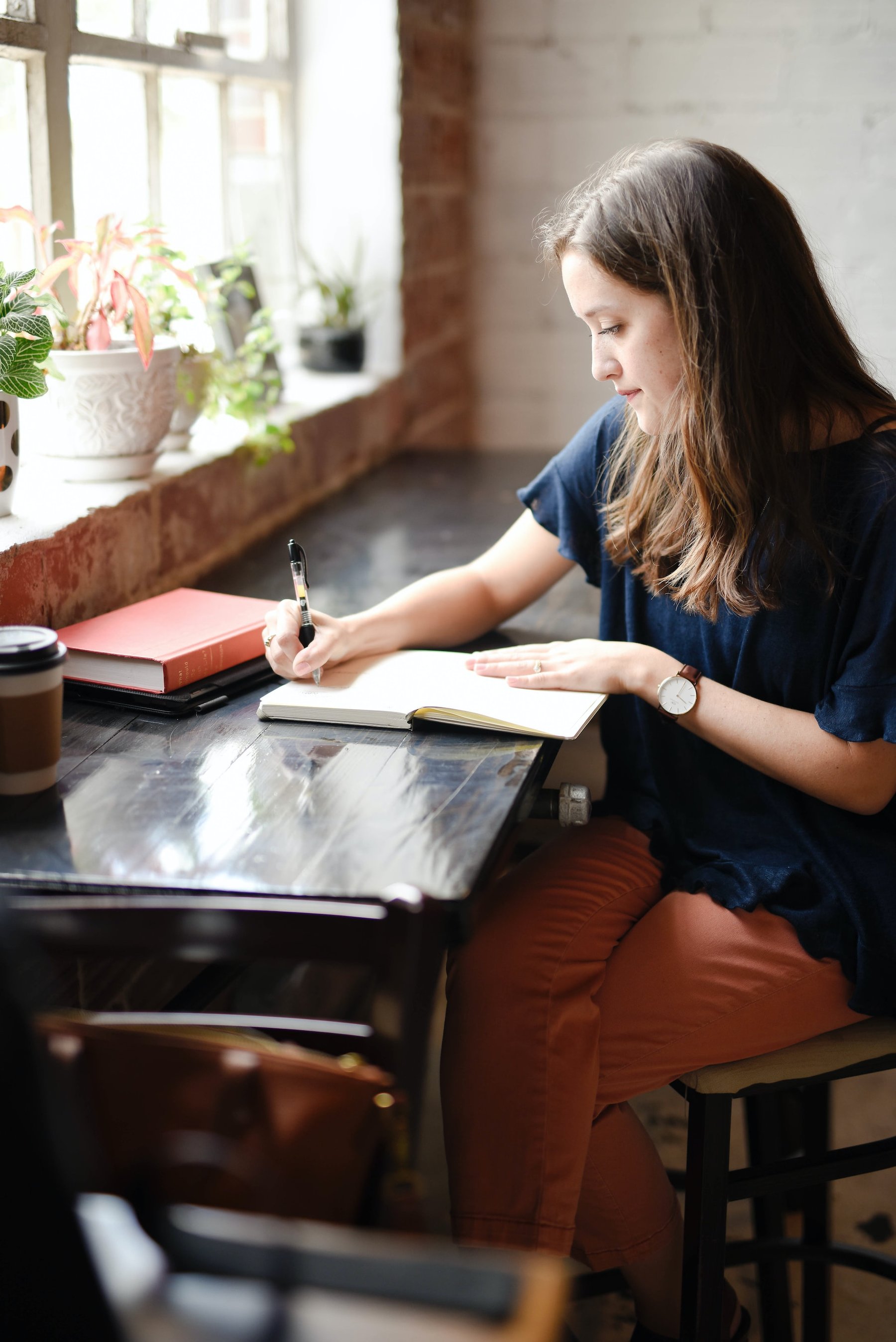 Woman writing journal