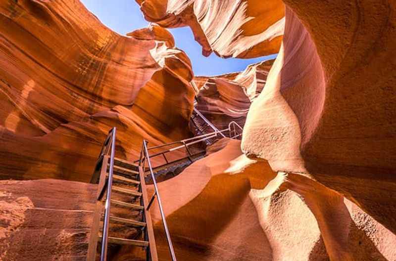 a ladder going through a slot in the slot canyon