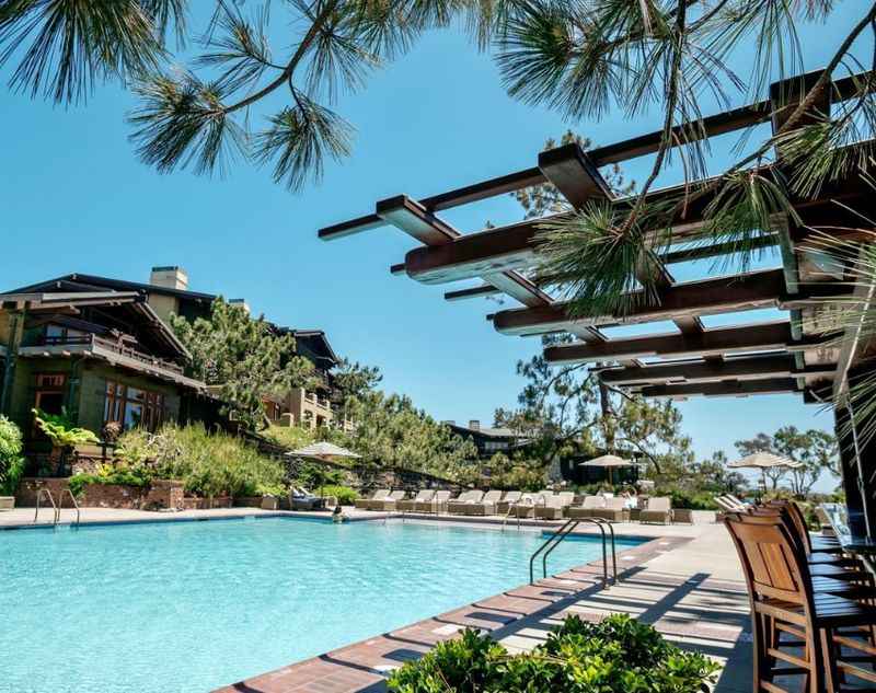 the pool at the resort with patio on the side