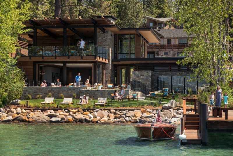 a house on the water with a dock