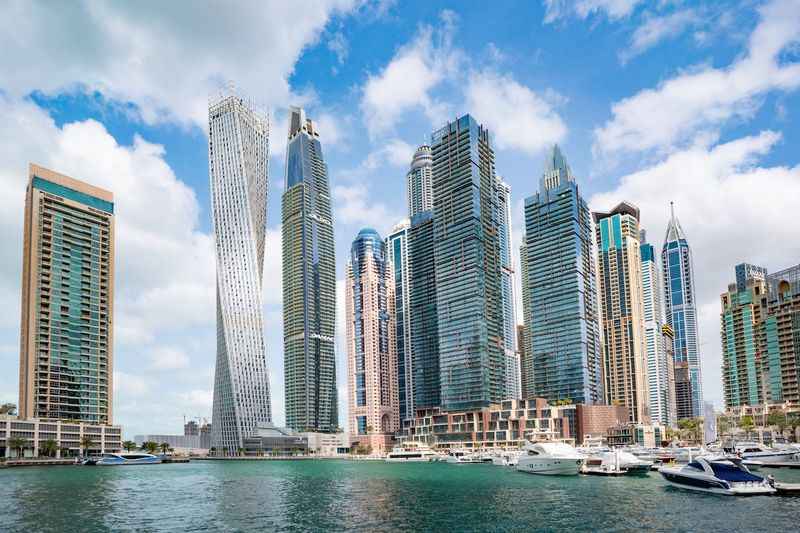 buildings with water in front of it