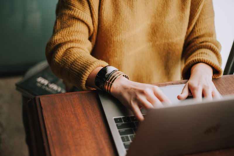 a woman using a laptop