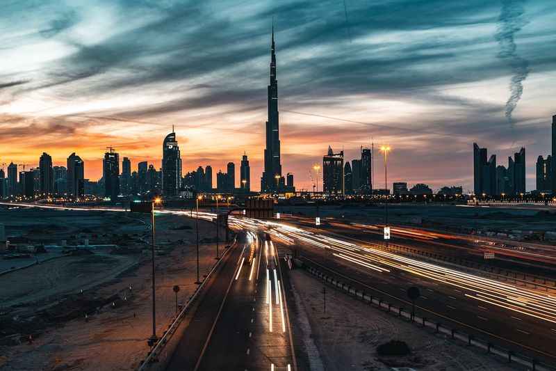 the skyline of city at sunset