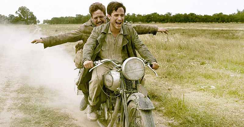 two men on motorbike 