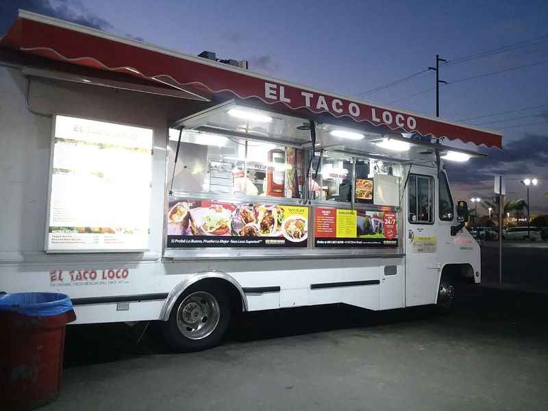 a food truck parked in a parking lot