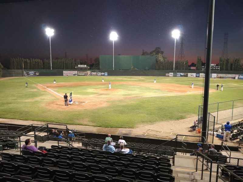 a baseball game is being played in a stadium