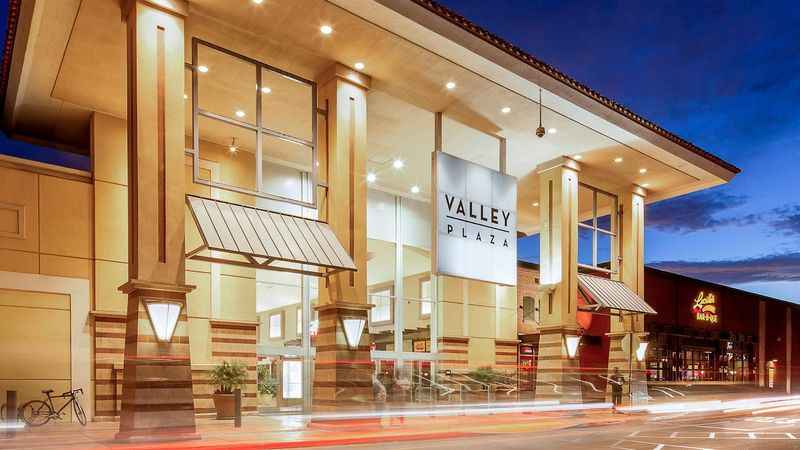 facade of valley plaza mall at night