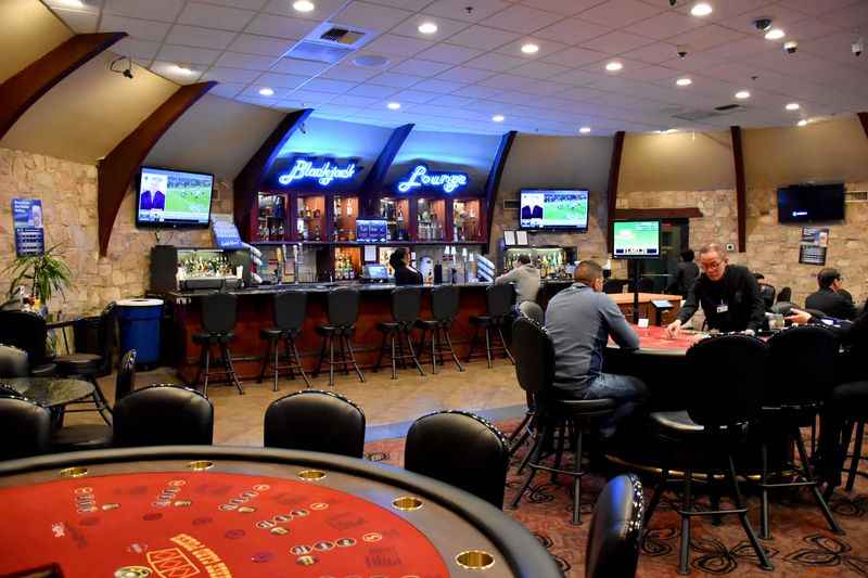 group of people on the table of casino