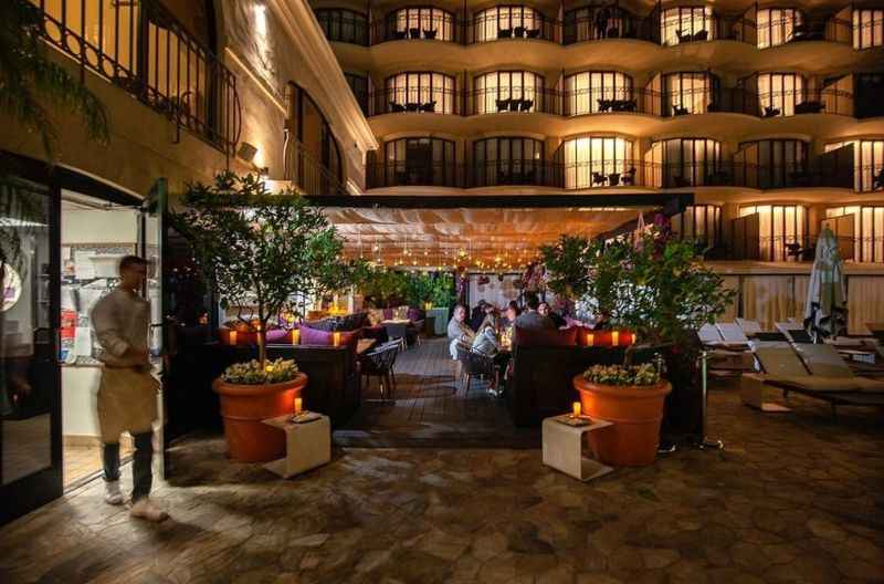 the courtyard at the hotel at night