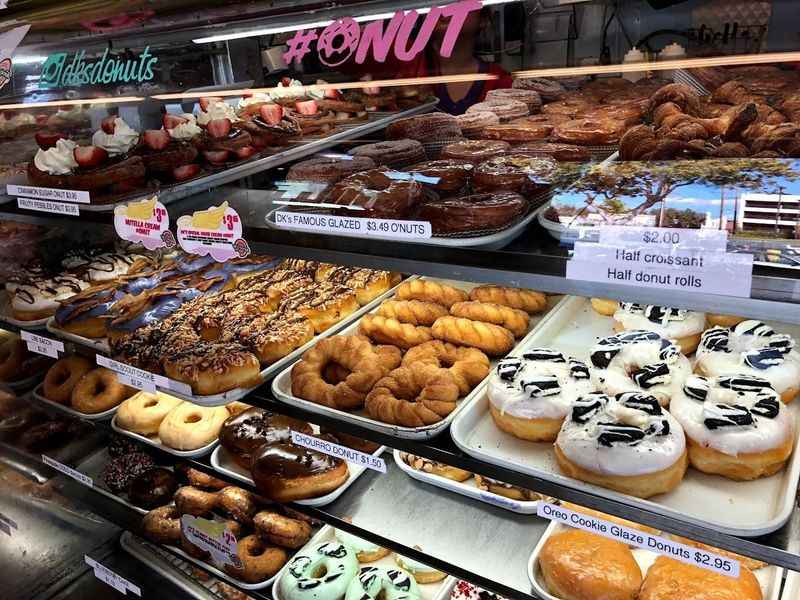 a display case filled with lots of different types of dough