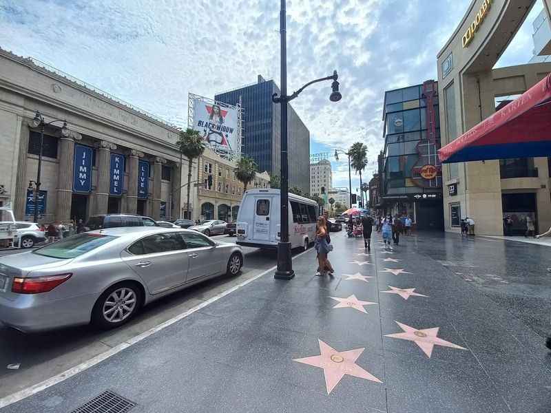 a sidewalk with the embedded stars