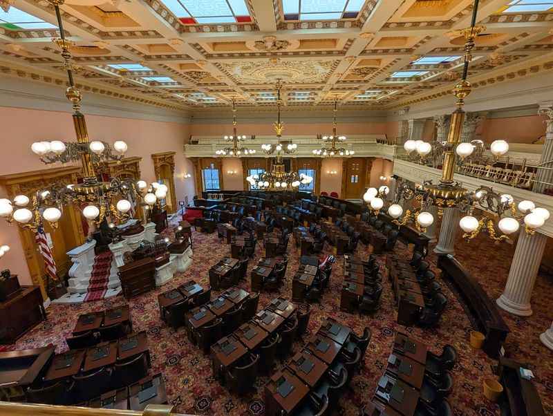 a large room with a lot of tables and chairs