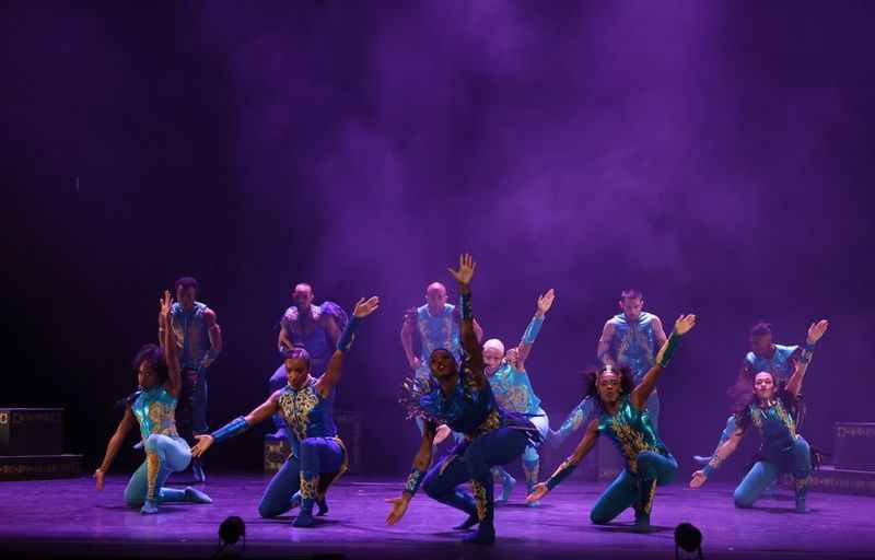 a group of dancers on stage