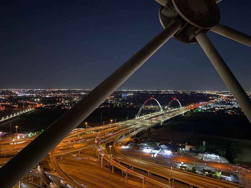 a view of a city at night from a high viewpoint