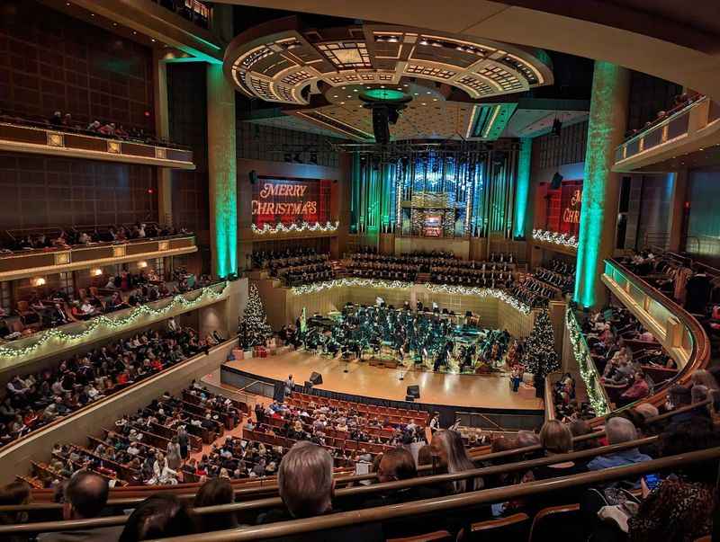 group of people in the stage at the Symphony Center