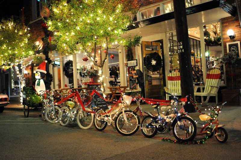 a row of bikes parked in front of a building