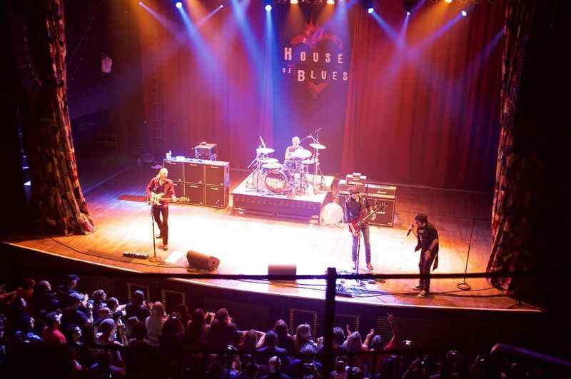 group of men performing at the theatre