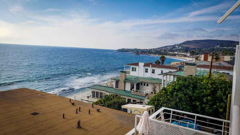 a view of a beach and a house