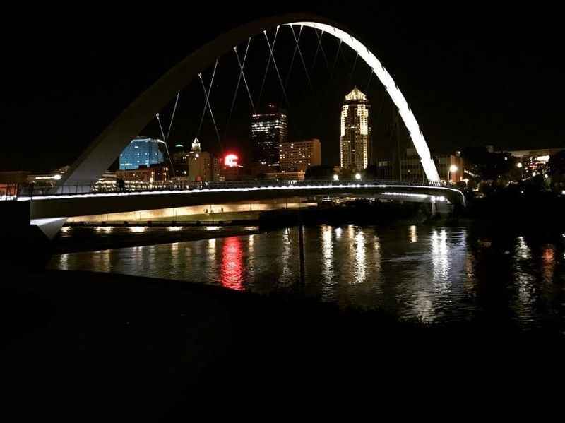 a bridge that is lit up at night