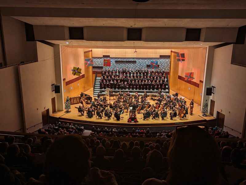 orchestra of the university of chicago performing at the auditorium