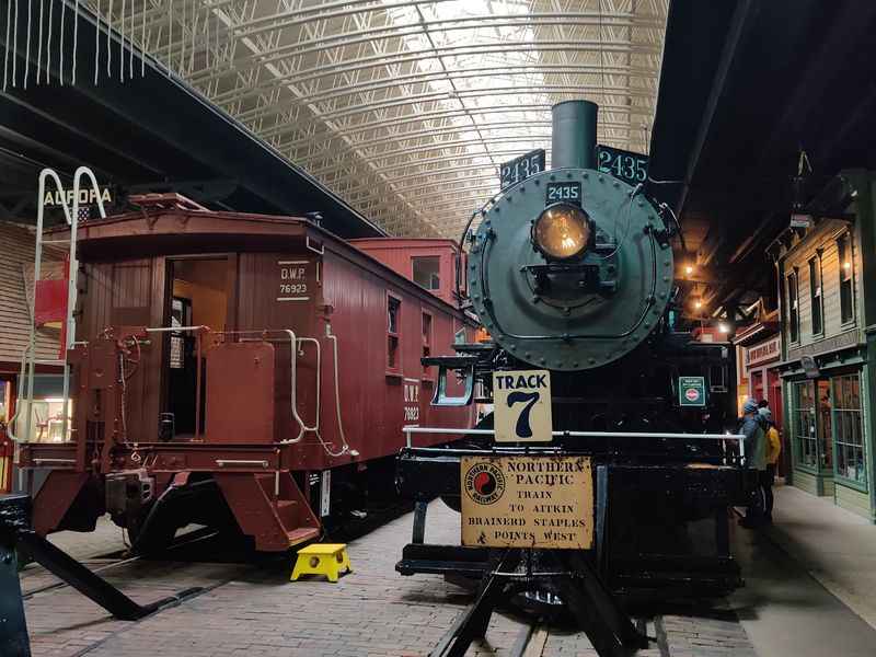 a train is parked inside of a building