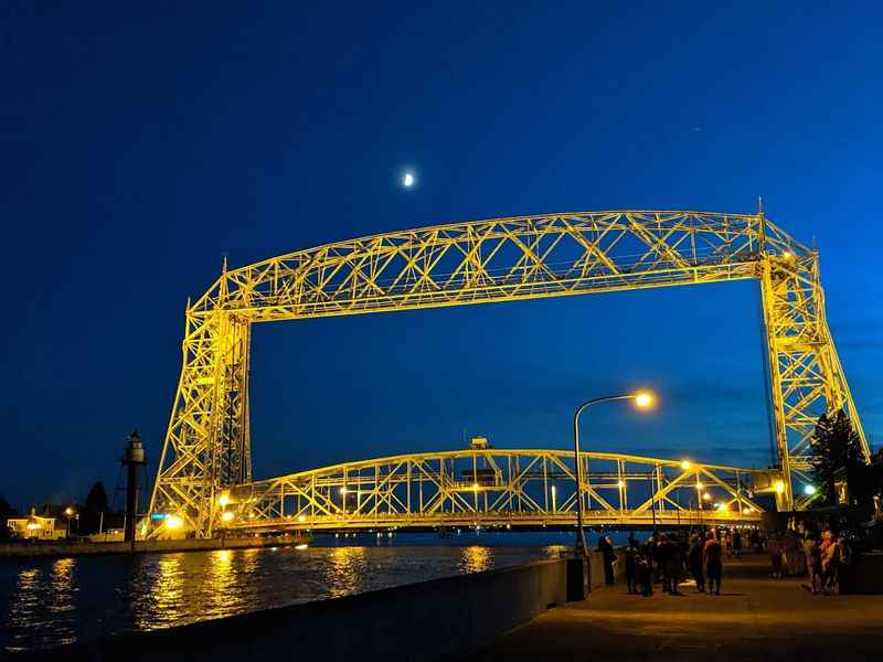 a bridge that is lit up at night