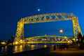 a bridge that is lit up at night