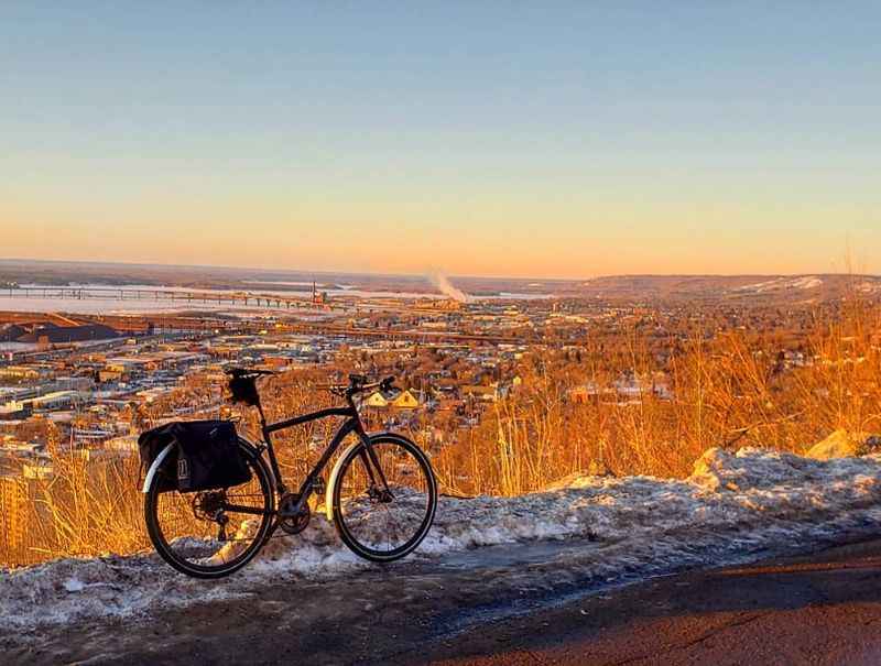 a bike parked on top of a mountain