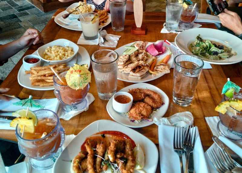 a table full of different kind of food