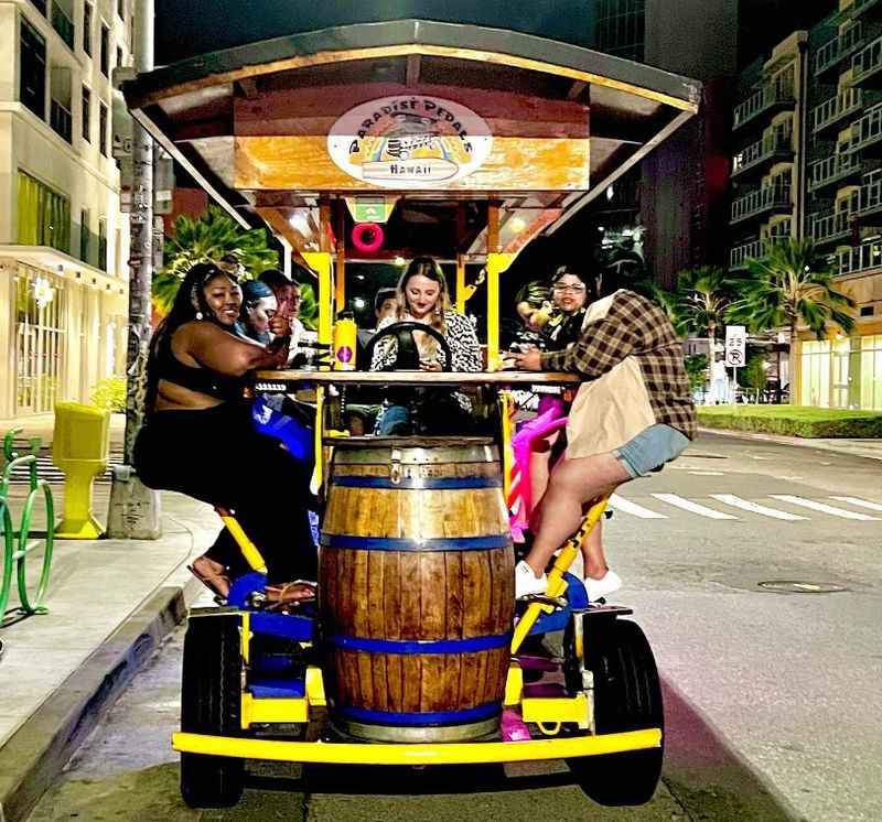 a group of people riding a small vehicle