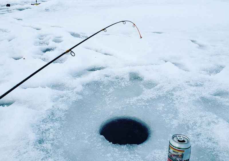 Ice Fishing at Kiruna in Winter