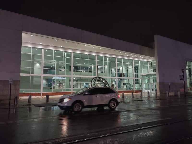 a car is parked outside of a building