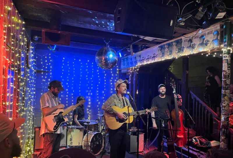 the band playing at the bar