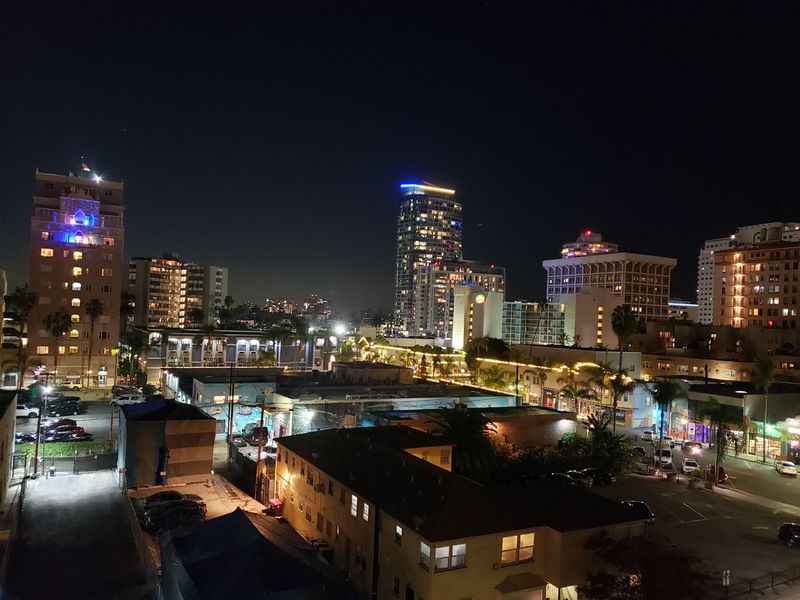 a city at night with a lot of buildings