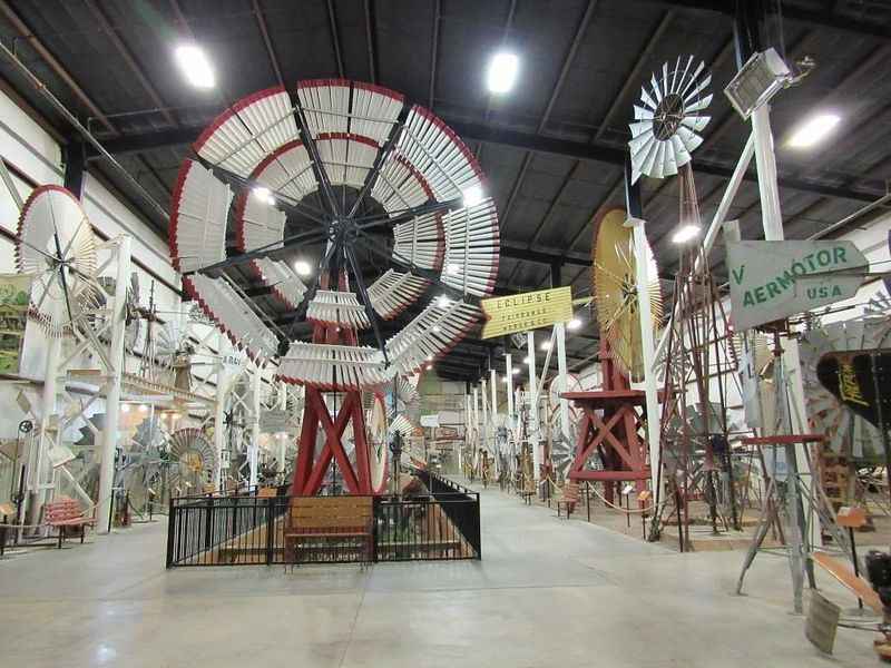 a large room with many different types of windmills