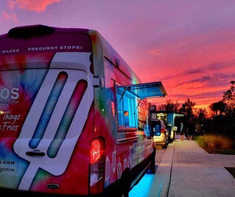 a food van parked on the side of a road