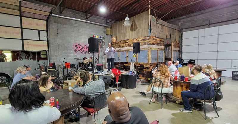 a group of people sitting around a table