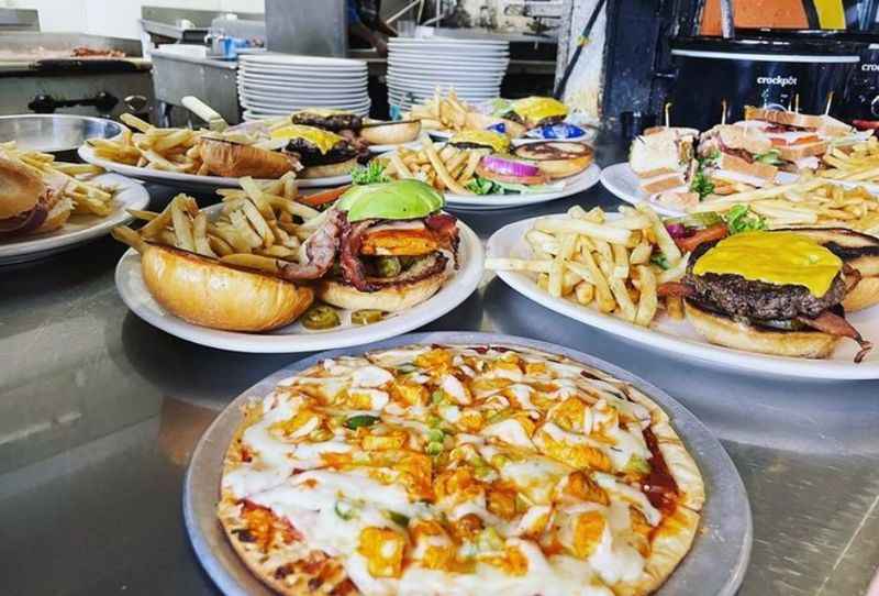 a table with plates of food and a machine