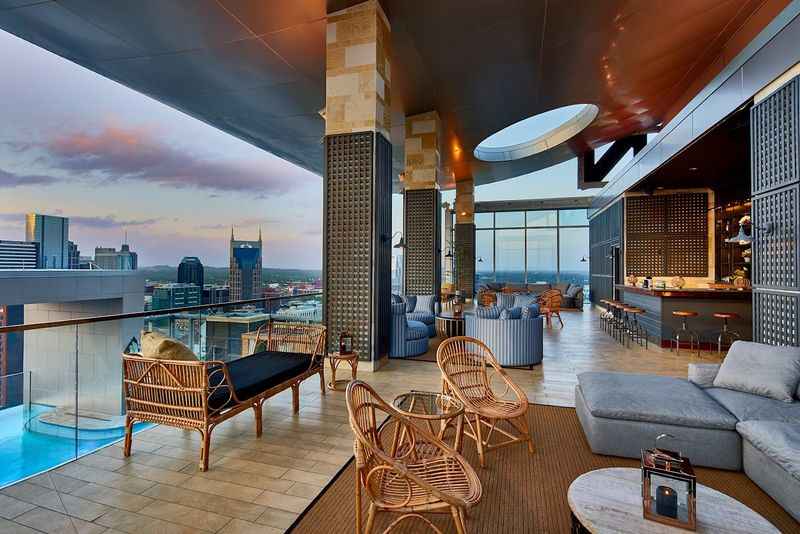 a rooftop with a view of the city