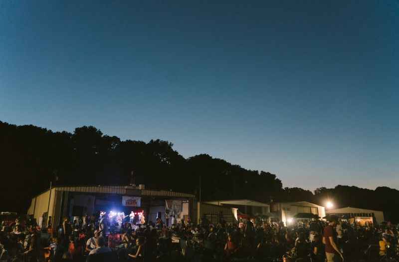 a crowd of people at night time