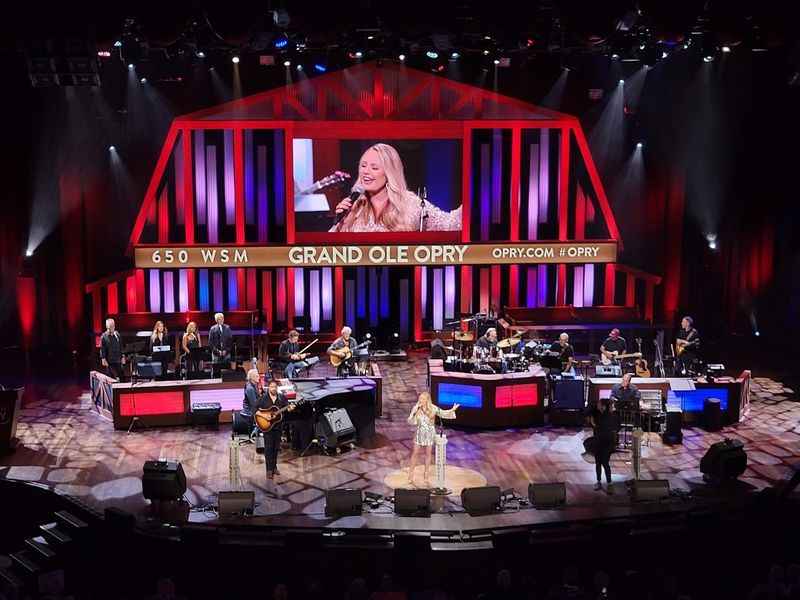 the band on stage at the Grand Ole Opry