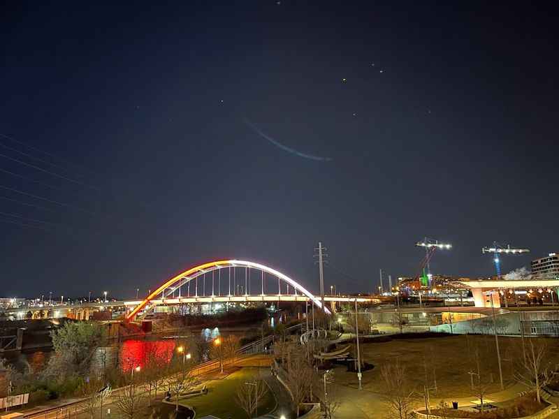 nighttime view of a bridge and a river