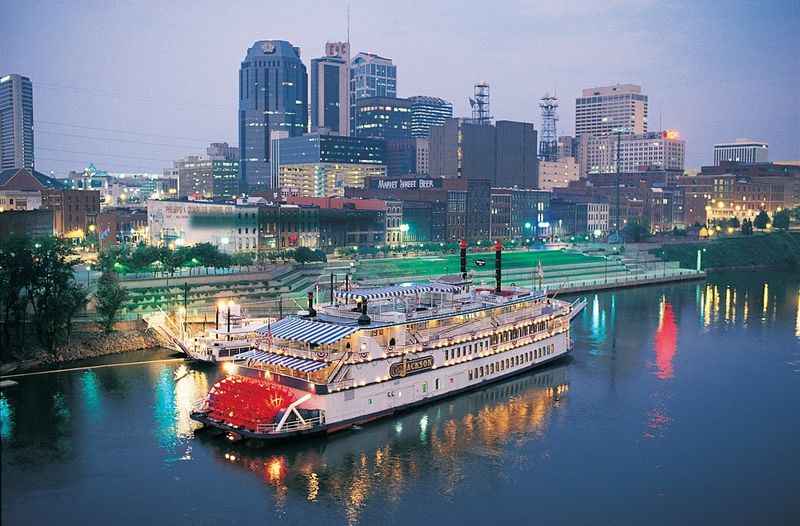 boat in the river with a view of the city