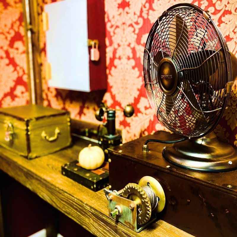 a fan sitting on a table in a room
