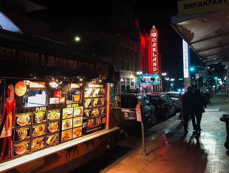 a sidewalk with a food truck