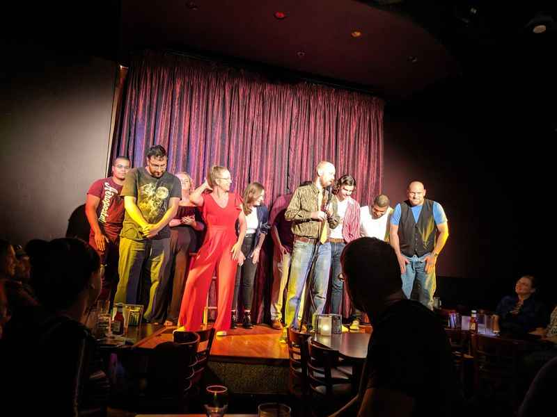 a group of people standing on a stage