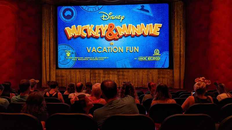 a large screen of  mickey and minnie movie