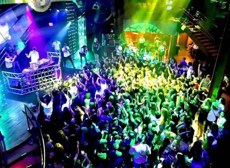 a crowd of people at a nightclub