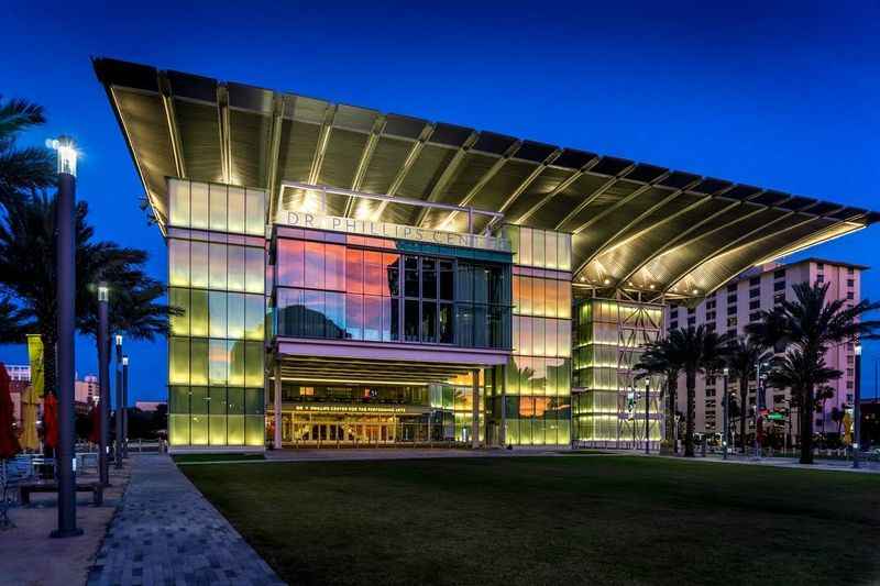 building with glass wall with lights at night