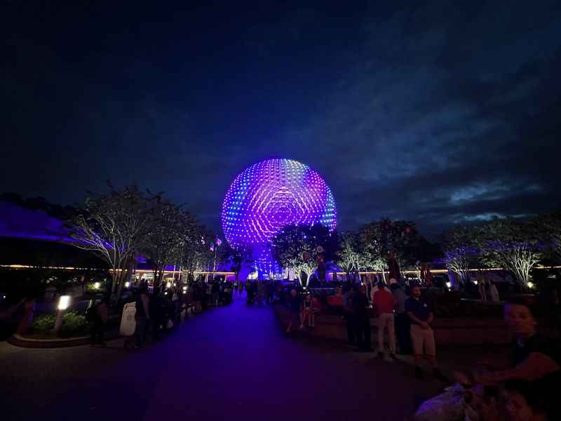 globe of walt disney at night